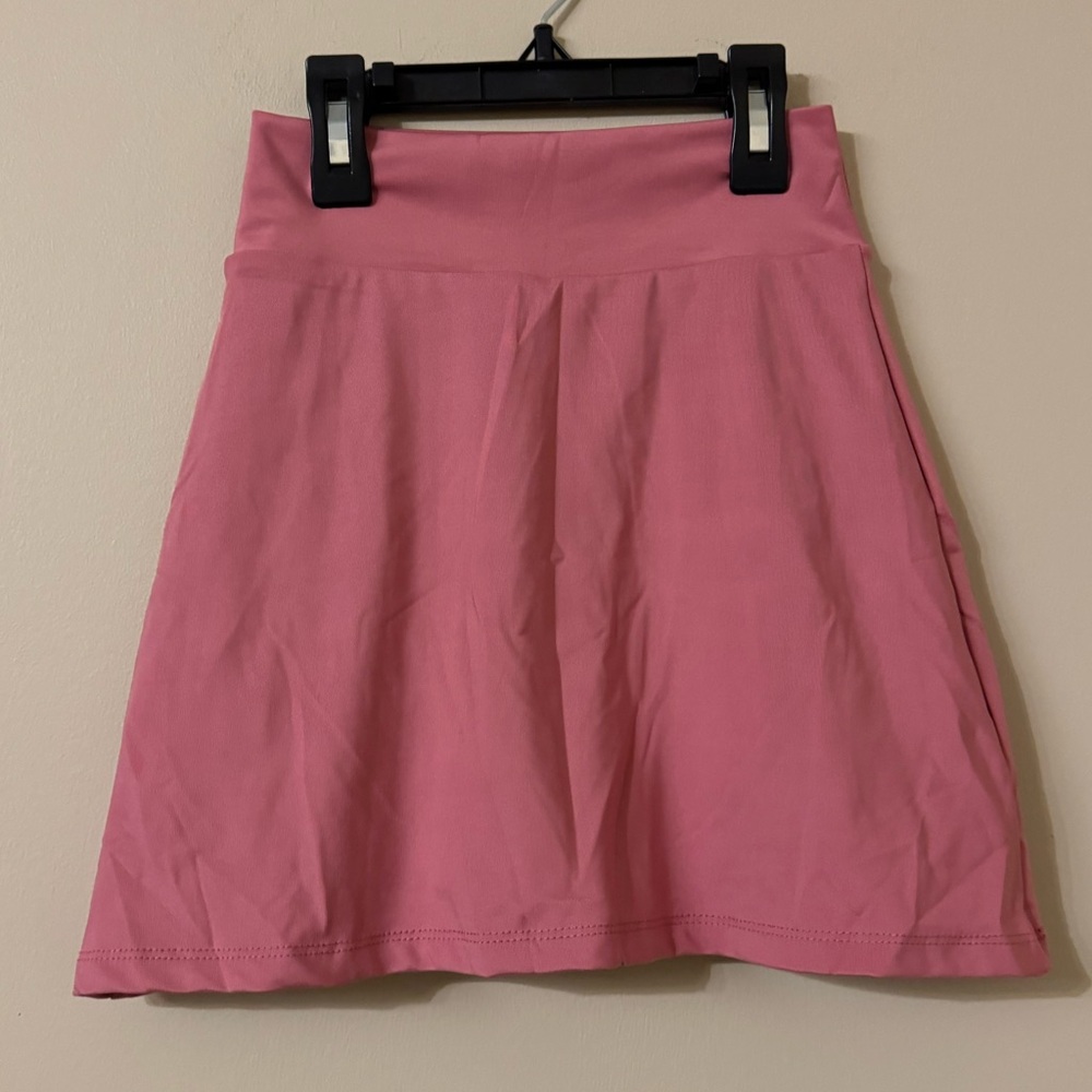 NFINITY TENNIS SKIRT WITH BACK PLEATS